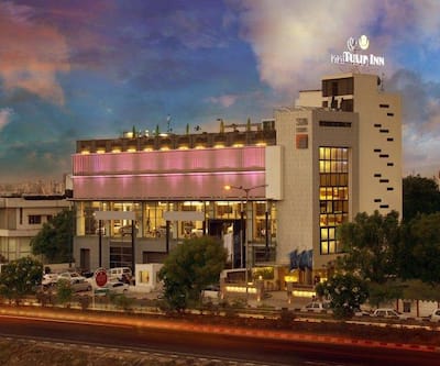 https://imgcld.yatra.com/ytimages/image/upload/t_hotel_yatra_city_desktop/v1432097544/Domestic Hotels/Hotels_Ahmedabad/Tulip Inn/Overiew.jpg
